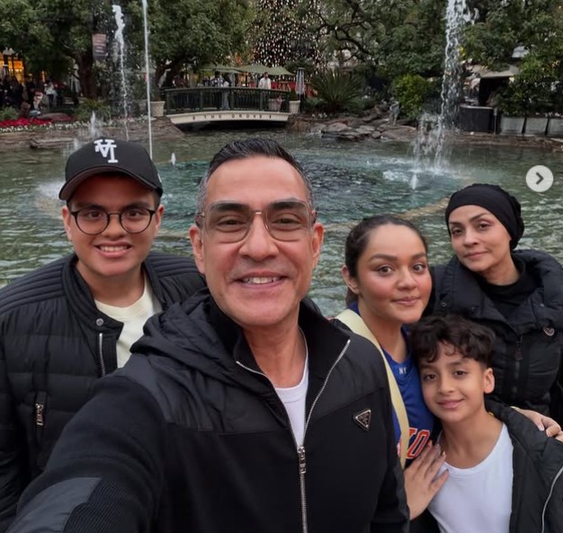 Ferdi Hasan with his wife and kids