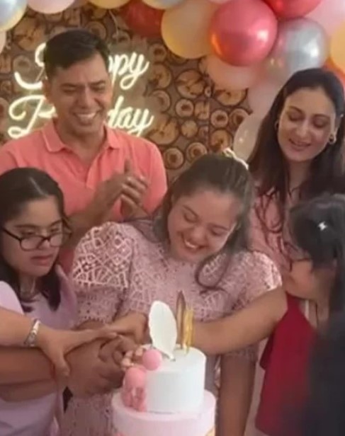 Ahida Sarmai with her family