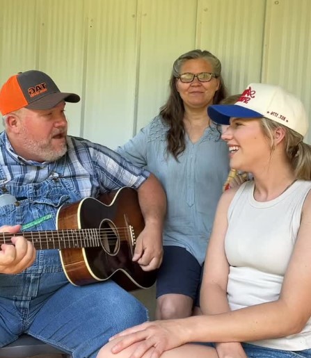 Hannah Harper with her parents