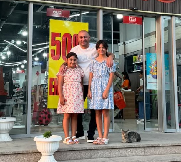 Ilkin Misgerli with his daughters