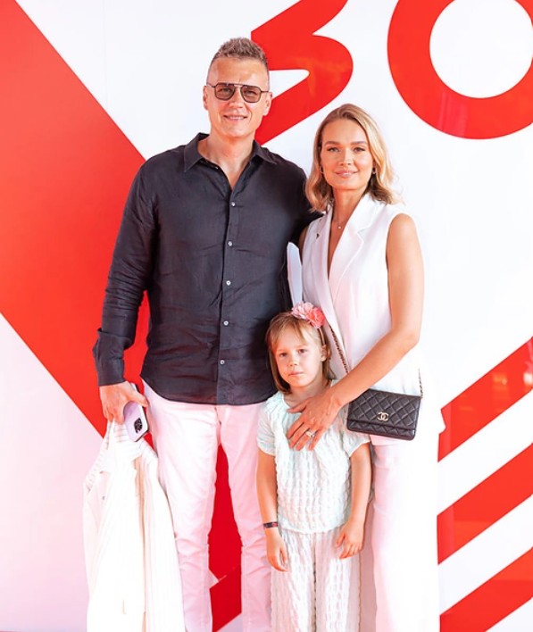 Jurgita Jurkute with her husband and daughter