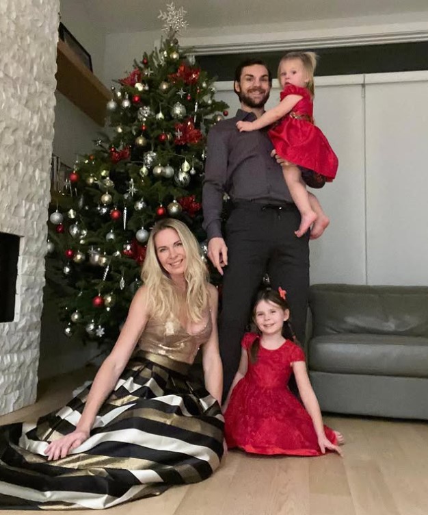 Diana Kobzanova with her husband and kids