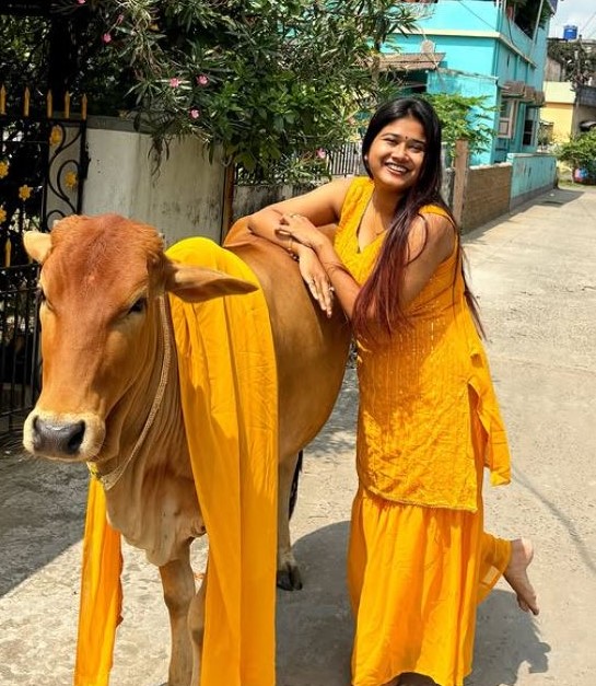 Sayoni Chakraborty with her cow Sundari