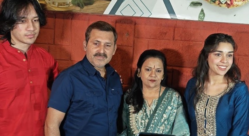 Eisha Singh with her parents and brother