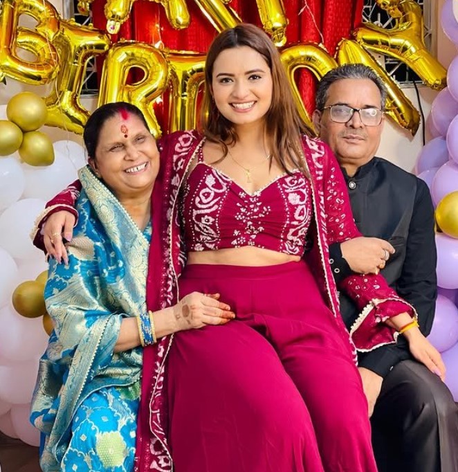 Neelam Giri with her parents