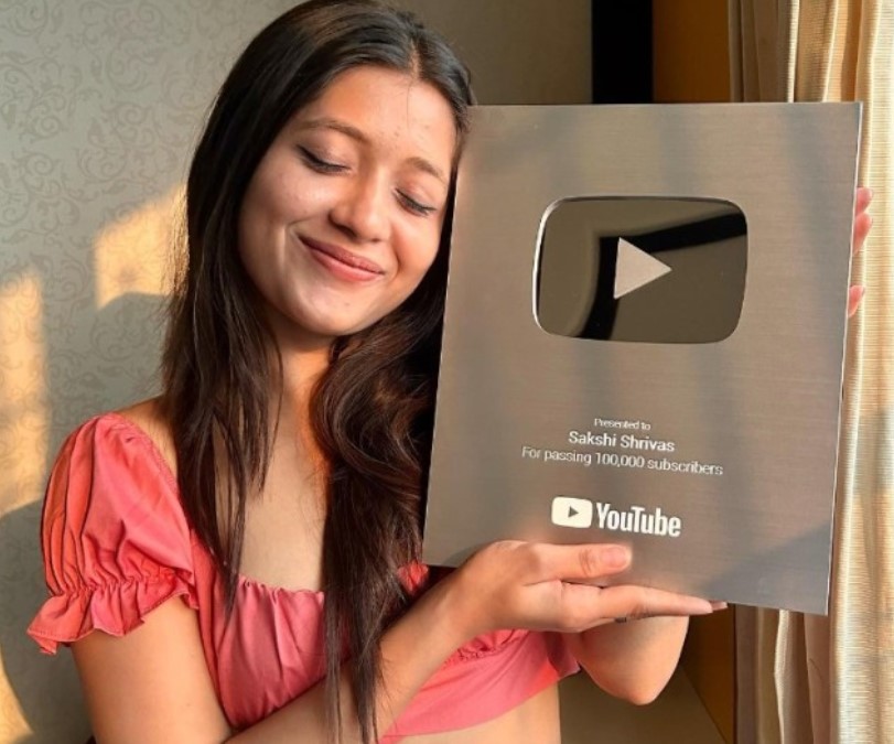 Sakshi Shrivas posing with her Silver play button