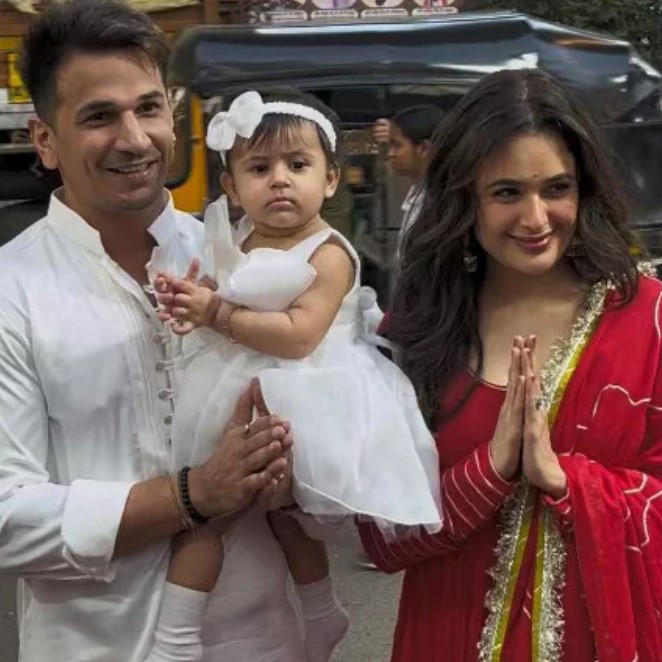 Yuvika Chaudhary with her husband and daughter