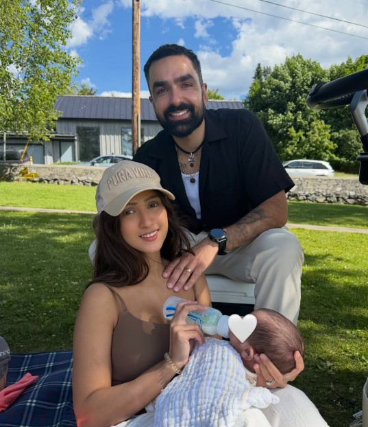 Krissann Barretto with her husband and kid