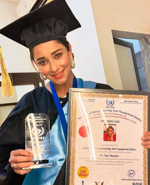 Nyra Banerjee with her honorary doctorate from the Institute of Entrepreneurship and Management Studies (IEMS)