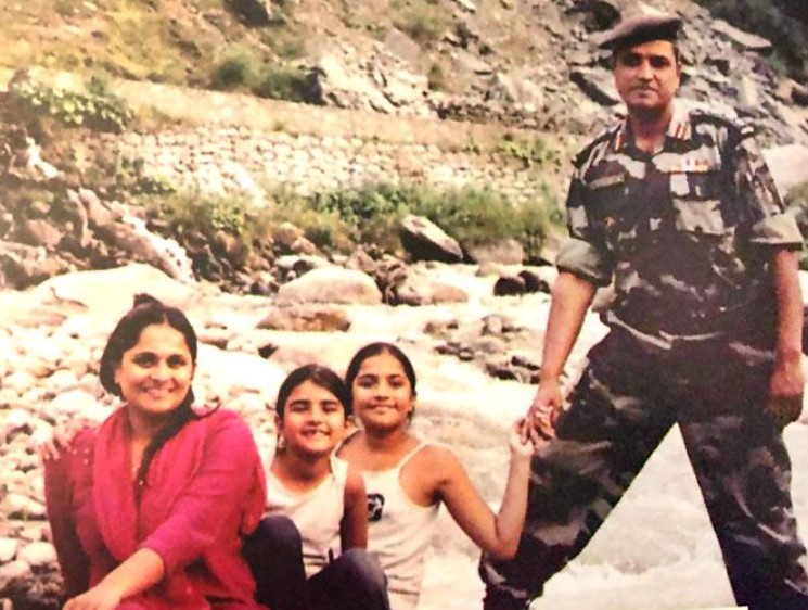 Rukmini Vasanth's childhood image with her parents and sister