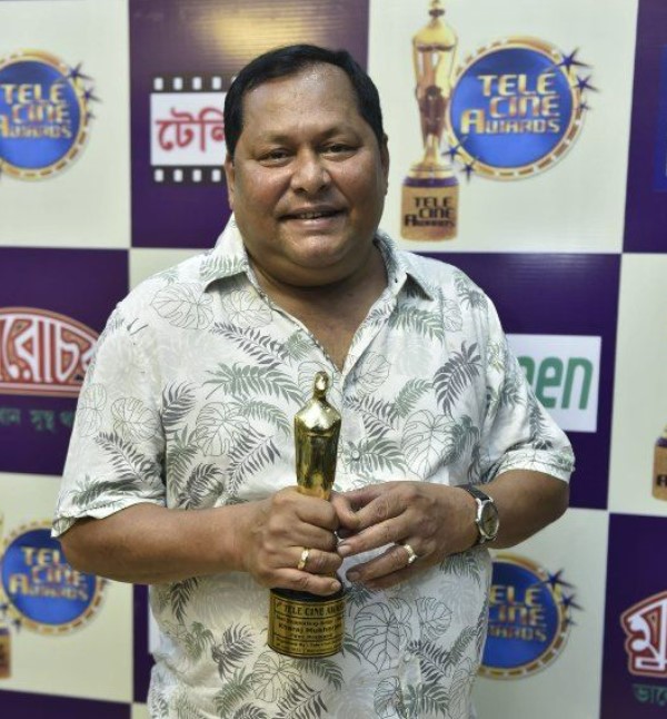 Kharaj Mukherjee won Best Supporting Actor award for the film 'Projapoti' at the 20th Tele Cine Awards
